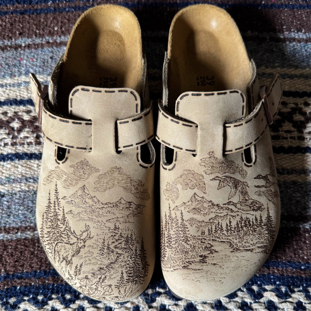 elk, mountains, ducks on tobacco brown clogs (oiled leather)
