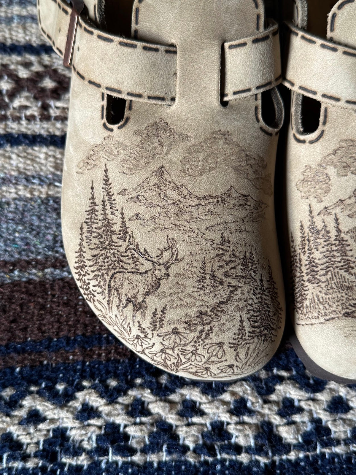 elk, mountains, ducks on tobacco brown clogs (oiled leather)