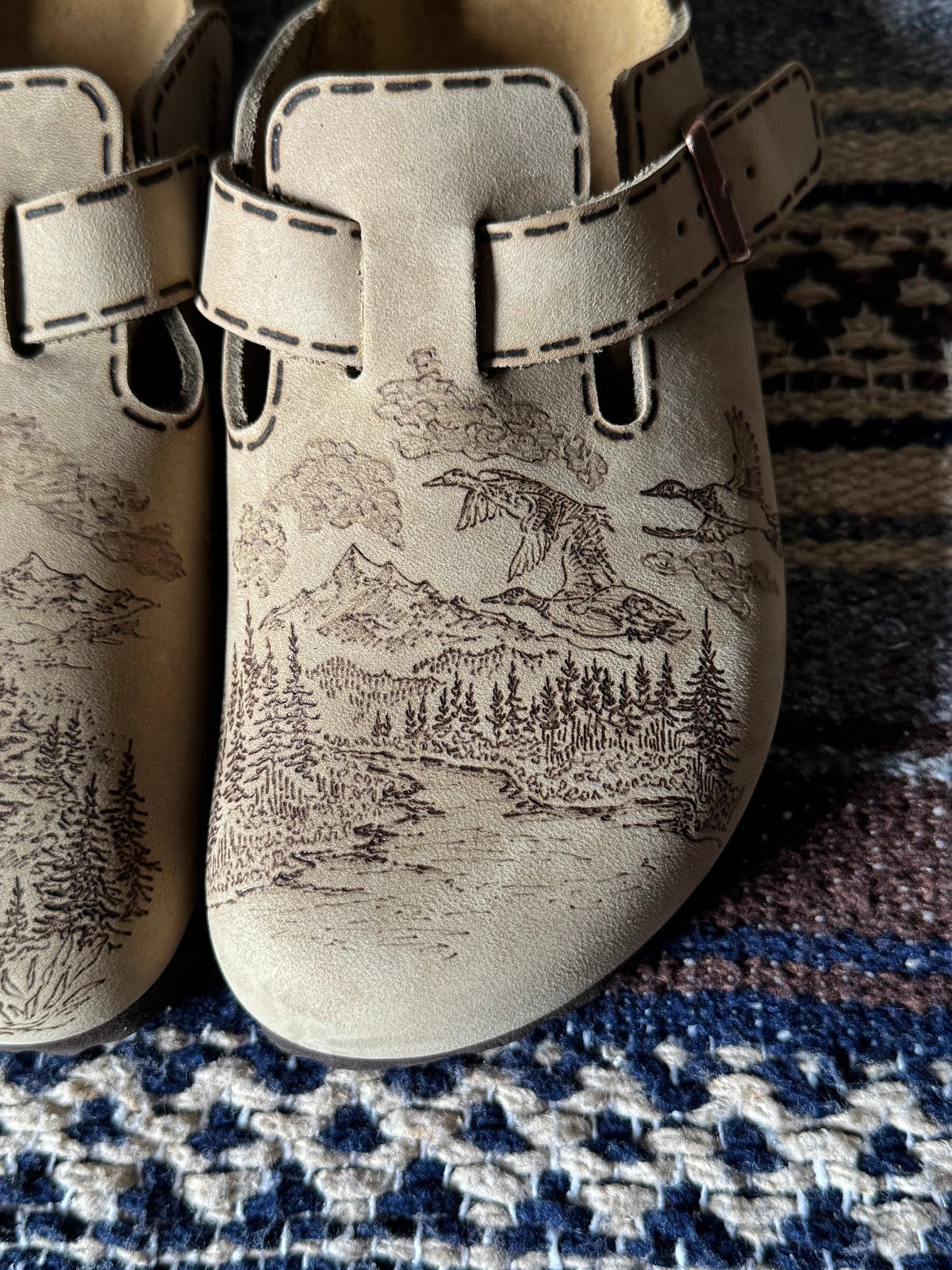 elk, mountains, ducks on tobacco brown clogs (oiled leather)